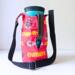 Handmade Kansas City Chiefs water bottle bag holds tumblers from 20 oz to 64 ounces securely, shown here with handle through the side snap.