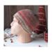 A hand knit wool blend beanie in rustic red and brown stripes. Ideal for adults & teens, it is crafted from soft Turkish yarns.