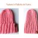 A hand knit pink wool hat in a flat lay orientation. For winter holiday gifting for kids ages 10, 11, 12, 13, 14.