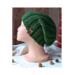 A hand knit green acrylic beanie in a ribbing stretchy stitch pattern. For winter holiday gifting for kids ages 10, 11, 12, 13, 14.