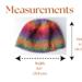 A babies & toddlers sized rainbow ombre hat knit with wool. Perfect for winter a gift for a baby or toddler ages 1, 2, 3, 4, 5 years old.