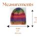 A babies & toddlers sized rainbow ombre hat knit with wool. Perfect for winter a gift for a baby or toddler ages 1, 2, 3, 4, 5 years old.