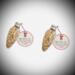 Set of two Magic Reindeer Food Ornaments with printed Christmas tags displayed on a white gradient background