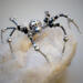 Artisan-crafted black and silver spider ornament made with glass beads, metallic accents, and elegant wirework.