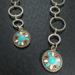 This is a pair of handmade western dangle earrings.