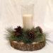 Handmade rustic wood slice candle centerpiece with pine greenery and pinecones, neutral farmhouse table decor for home, weddings, and events
