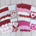 A Valentine's Day card making kit to make 24 mini valentines (3x3 inches) with red, pink and white hearts. Comes with cards and envelopes.