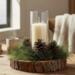 Farmhouse wood slice candle centerpiece with pine greenery, neutral everyday home table decor
