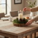 Rustic wood slice candle centerpiece being styled on dining table, neutral farmhouse home decor accent