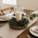 Rustic candle centerpiece with pinecones on dining table, neutral farmhouse centerpiece decor
