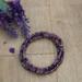 This beautiful purple bracelet is made of seed beads and is stackable.