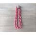 Pink faceted bead necklace