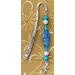Beautiful turquoise beaded silver shepherd hook baookmark.  5" hook with turquoise pendant in middle and, at bottom is a kokokpelli flutist charm.  Native American design from top to bottm.  Beads have a mirror box image which is nice to view.  Enjoy1