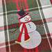 Close up of the snowman on the towel