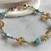Wire wrap bracelet topaz and aqua beads