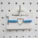 Macrame bracelet with large silver heart charm