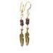 Embossed golden feather charm hangs below 3 cherry creek jasper stone beads in these southwestern styled dangle earrings.