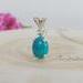Sleeping Beauty Turquoise Oval Pendant in Sterling Silver