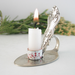 vintage silver plated spoon made into a tiny candle holder