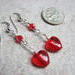 All metal parts are made of sterling silver in these red heart earrings