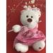 For the young flutist this bear is the cutest Valentines Day gift they can receive.  A white bear with a brown nose, rhinestone pierced earrings, white ribbons with red glitter hearts for accenting.  Little rhinestone hearts on bottom of feet, silk like fabric with hints of red, and last but not least she is playing a silver wood flute. May be purchased with or without flute.