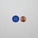 Scrapbook die cut and embossed buttons, primary colors