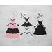 Fancy die cut dresses and hangers, pink, black, and white