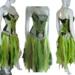 A black and lime green tattered dress with touches of white. A lace up back for a great fit. Features crochet on the bodice and is a fun event dress. One of a kind, hand made, eco-friendly bohemian style dress.